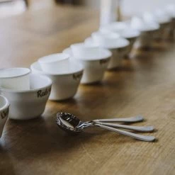 Brewista Professional Cupping Spoon - Gold 8 Brewista Professional Cupping Spoon - Gold -Coffee Gear Shop BrewistaCuppingSpoononbenchwithcups